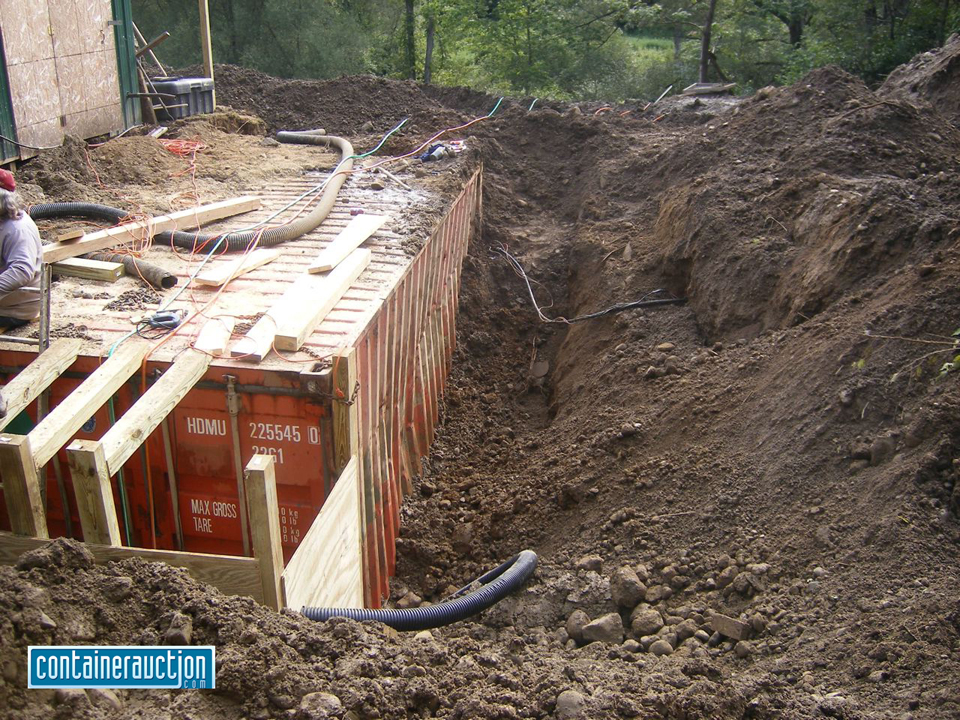 Shipping container underground bunker. If you reinforce the container you  can bury them. This on…